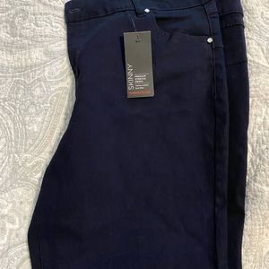 Avenue skinny jeans. 18. NWT. With jeweled button hem. Dark navy.